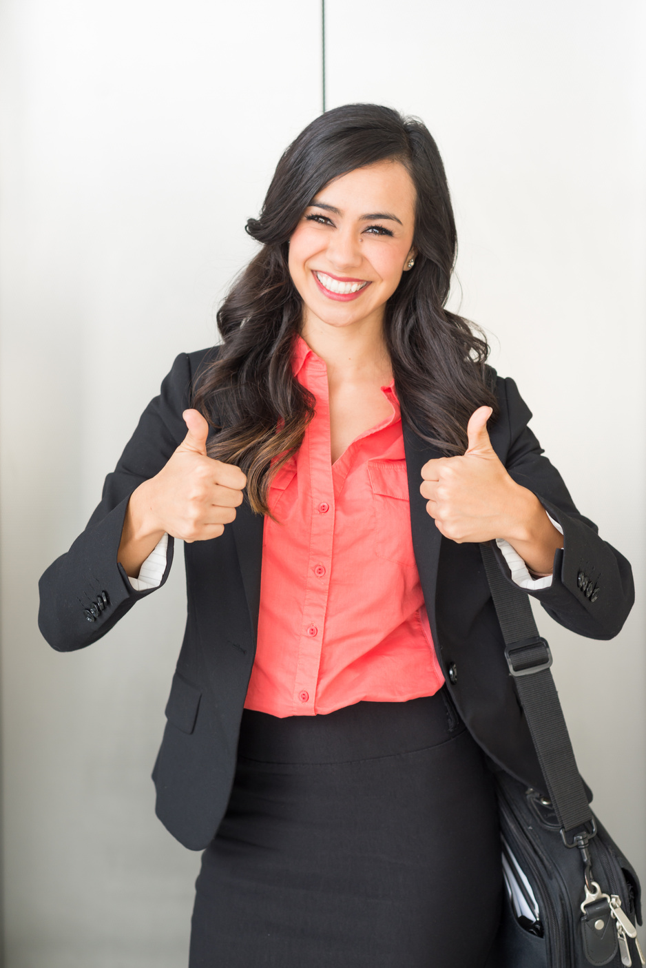 Young Business Women Thumbs Up